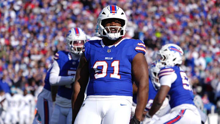 Nov 3, 2024; Orchard Park, New York, USA; Buffalo Bills defensive tackle Ed Oliver (91) reacts to making a defensive play during the first half against the Buffalo Bills at Highmark Stadium.