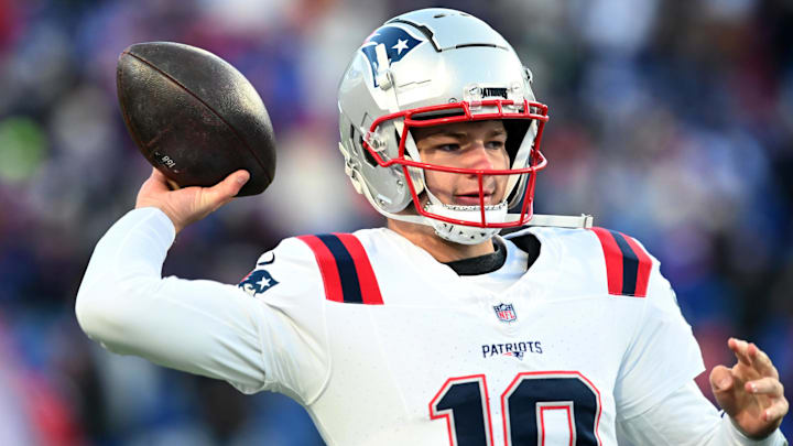 Dec 22, 2024; Orchard Park, New York, USA; New England Patriots quarterback Drake Maye (10) warms up before a game against the Buffalo Bills at Highmark Stadium. Mandatory Credit: Mark Konezny-Imagn Images