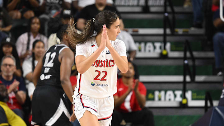 Jul 10, 2025; Washington, District of Columbia, USA; Washington Mystics guard Sonia Citron (22) reacts after scoring a basket against the Las Vegas Aces during the fourth quarter at EagleBank Arena. Mandatory Credit: Rafael Suanes-Imagn Images