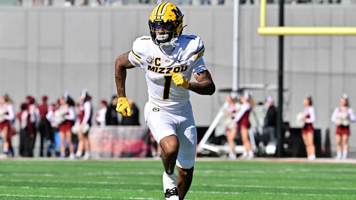 Oct 12, 2024; Amherst, Massachusetts, USA; Missouri Tigers wide receiver Theo Wease Jr. (1)  runs a route during the second half against the Massachusetts Minutemen at Warren McGuirk Alumni Stadium. Mandatory Credit: Eric Canha-Imagn Images