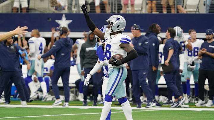 Sep 14, 2025; Arlington, Texas, USA; Dallas Cowboys safety Donovan Wilson (6) reacts after making an interception against the New York Giants during overtime at AT&T Stadium. Mandatory Credit: Raymond Carlin III-Imagn Images