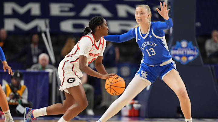 Mar 5, 2026; Greenville, SC, USA; Kentucky Wildcats center Clara Strack (13) on defense against Georgia Bulldogs guard Dani Carnegie (3) during the first half at Bon Secours Wellness Arena. Mandatory Credit: Jim Dedmon-Imagn Images