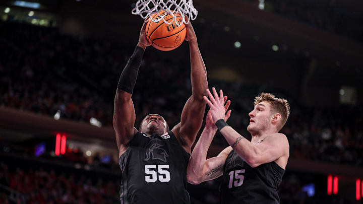 Jan 25, 2025; New York, New York, USA; Michigan State Spartans forward Coen Carr (55) rebounds during the first half against the Rutgers Scarlet Knights at Madison Square Garden. Mandatory Credit: Vincent Carchietta-Imagn Images