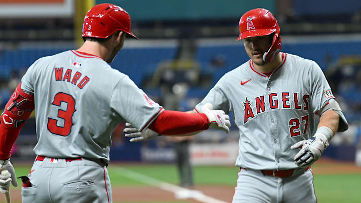 Apr 17, 2024; St. Petersburg, Florida, USA; Los Angeles Angels center fielder Mike Trout (27) celebrates with designated hitter Taylor Ward (3) after hitting a solo home run in the first inning against the Tampa Bay Rays at Tropicana Field. Mandatory Credit: Jonathan Dyer-Imagn Images Apr 17, 2024; St. Petersburg, Florida, USA; Los Angeles Angels center fielder Mike Trout (27) celebrates with designated hitter Taylor Ward (3) after hitting a solo home run in the first inning against the Tampa Bay Rays at Tropicana Field. Mandatory Credit: Jonathan Dyer-Imagn Images