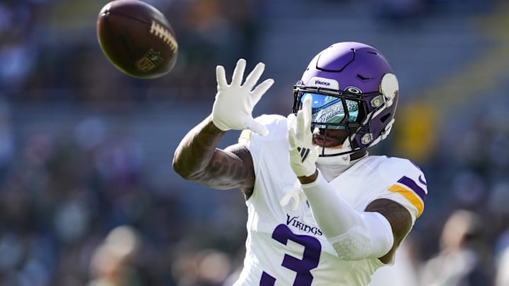 Sep 29, 2024; Green Bay, Wisconsin, USA;  Minnesota Vikings wide receiver Jordan Addison (3) catches a pass during warmups prior to the game against the Green Bay Packers at Lambeau Field.
