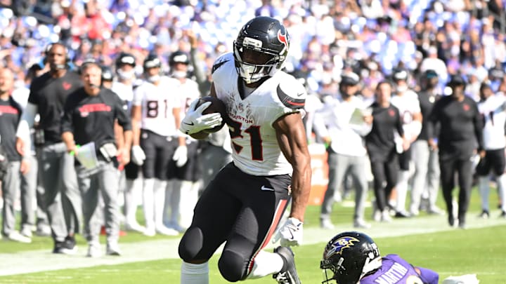 Oct 5, 2025; Baltimore, Maryland, USA; Houston Texans running back Nick Chubb (21) runs for a gain past Baltimore Ravens cornerback Keyon Martin (38) during the third quarter at M&T Bank Stadium. Mandatory Credit: Rafael Suanes-Imagn Images Oct 5, 2025; Baltimore, Maryland, USA; Houston Texans running back Nick Chubb (21) runs for a gain past Baltimore Ravens cornerback Keyon Martin (38) during the third quarter at M&T Bank Stadium. Mandatory Credit: Rafael Suanes-Imagn Images
