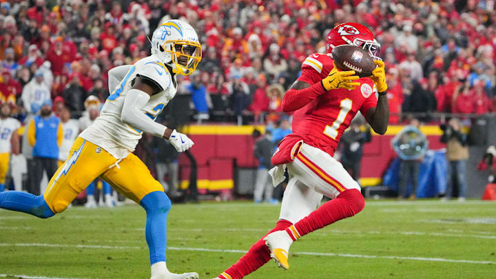 Dec 8, 2024; Kansas City, Missouri, USA; Kansas City Chiefs wide receiver Xavier Worthy (1) runs the ball as Los Angeles Chargers cornerback Cam Hart (20) defends during the first half at GEHA Field at Arrowhead Stadium. Mandatory Credit: Denny Medley-Imagn Images Dec 8, 2024; Kansas City, Missouri, USA; Kansas City Chiefs wide receiver Xavier Worthy (1) runs the ball as Los Angeles Chargers cornerback Cam Hart (20) defends during the first half at GEHA Field at Arrowhead Stadium. Mandatory Credit: Denny Medley-Imagn Images