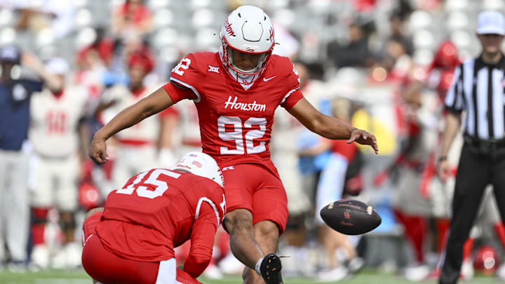 Houston Cougars kicker Ethan Sanchez (92) kicks the ball against the Arizona Wildcats at TDECU Stadium. Houston Cougars kicker Ethan Sanchez (92) kicks the ball against the Arizona Wildcats at TDECU Stadium.