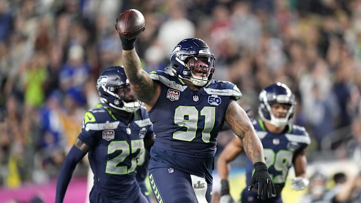 Seattle Seahawks defensive tackle Byron Murphy II after recovering a fumble against the New England Patriots  in Super Bowl LX at Levi's Stadium. 