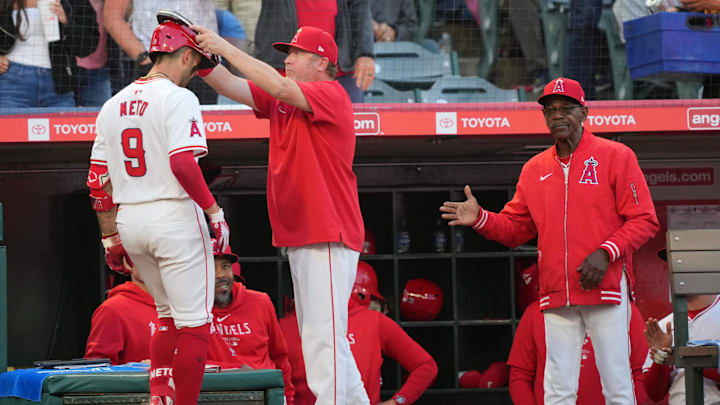 Jun 17, 2024; Anaheim, California, USA; Los Angeles Angels shortstop Zach Neto (9) is congratulated by bench coach Ray Montgomery (81) and manager Ron Washington after hitting a two-run home run in the fourth inning against the Milwaukee Brewers at Angel Stadium. Mandatory Credit: Kirby Lee-Imagn Images Jun 17, 2024; Anaheim, California, USA; Los Angeles Angels shortstop Zach Neto (9) is congratulated by bench coach Ray Montgomery (81) and manager Ron Washington after hitting a two-run home run in the fourth inning against the Milwaukee Brewers at Angel Stadium. Mandatory Credit: Kirby Lee-Imagn Images