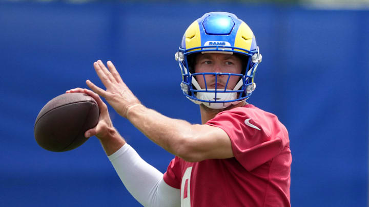 Jun 3, 2025; Woodland Hills, CA, USA; Los Angeles Rams quarterback Matthew Stafford (9) throws the ball during organized team activities at Rams Practice Facility. Mandatory Credit: Kirby Lee-Imagn Images