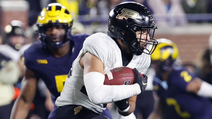 Purdue Boilermakers running back Devin Mockobee (45) rushes in the first half Purdue Boilermakers running back Devin Mockobee (45) rushes in the first half