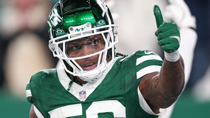 Jan 5, 2025; East Rutherford, New Jersey, USA; New York Jets linebacker Quincy Williams (56) celebrates after a defensive stop during the second half against the Miami Dolphins at MetLife Stadium. Mandatory Credit: Vincent Carchietta-Imagn Images Jan 5, 2025; East Rutherford, New Jersey, USA; New York Jets linebacker Quincy Williams (56) celebrates after a defensive stop during the second half against the Miami Dolphins at MetLife Stadium. Mandatory Credit: Vincent Carchietta-Imagn Images