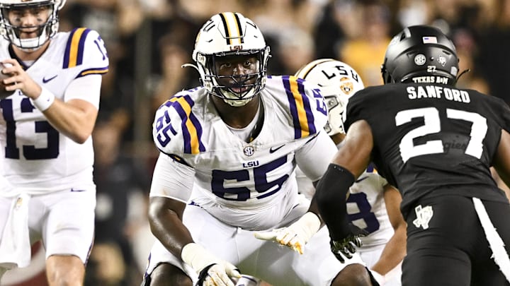 LSU Tigers offensive lineman Paul Mubenga (65) lines up during the second half against the Texas A&M Aggies. 