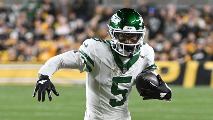 Oct 20, 2024; Pittsburgh, Pennsylvania, USA; New York Jets wide receiver Garrett Wilson (5) runs against the Pittsburgh Steelers during the first quarter at Acrisure Stadium. 
