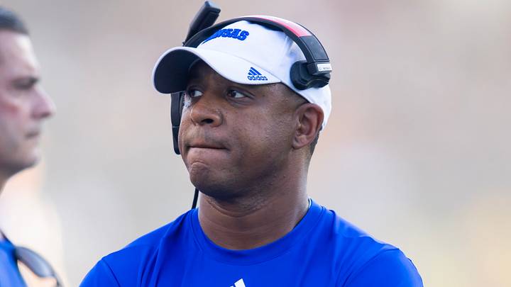 Oct 5, 2024; Tempe, Arizona, USA; Kansas Jayhawks defensive backs coach D.K. McDonald against the Arizona State Sun Devils at Mountain America Stadium. Mandatory Credit: Mark J. Rebilas-Imagn Images Oct 5, 2024; Tempe, Arizona, USA; Kansas Jayhawks defensive backs coach D.K. McDonald against the Arizona State Sun Devils at Mountain America Stadium. Mandatory Credit: Mark J. Rebilas-Imagn Images