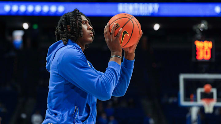 Kentucky's Jayden Quaintance shoots baskets while warming up with his team before the Hoosiers and Wildcats play college basketball at Rupp Arena in Lexington, Kentucky December 13, 2025. Kentucky's Jayden Quaintance shoots baskets while warming up with his team before the Hoosiers and Wildcats play college basketball at Rupp Arena in Lexington, Kentucky December 13, 2025.