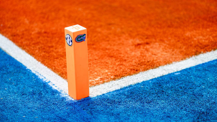A pylon with Gator head logo sits on the field before the game between the Florida Gators and South