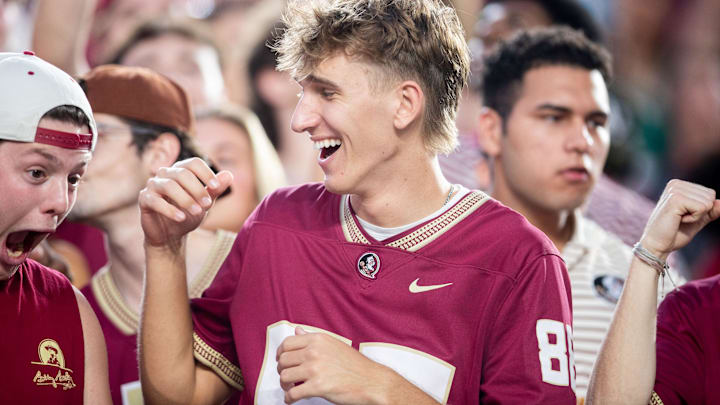 Florida State Seminole fans cheer on the football team as they play the Miami Hurricanes on Saturday, Oct. 4, 2025.