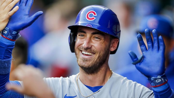 Chicago Cubs first baseman Cody Bellinger (24) high fives