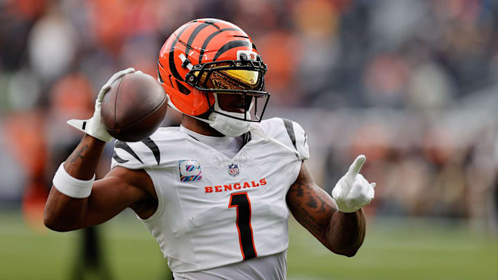 Sep 29, 2025; Denver, Colorado, USA; Cincinnati Bengals wide receiver Ja'Marr Chase (1) warms up before the game against the Denver Broncos at Empower Field at Mile High. Mandatory Credit: Isaiah J. Downing-Imagn Images