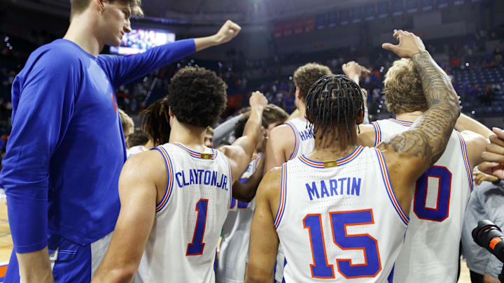 Mar 1, 2025; Gainesville, Florida, USA; Florida Gators guard Walter Clayton Jr. (1) and center Olivier Rioux (32) and guard Alijah Martin (15) and forward Thomas Haugh (10) huddle after the game against the Texas A&M Aggies at Exactech Arena at the Stephen C. O'Connell Center. Mandatory Credit: Morgan Tencza-Imagn Images