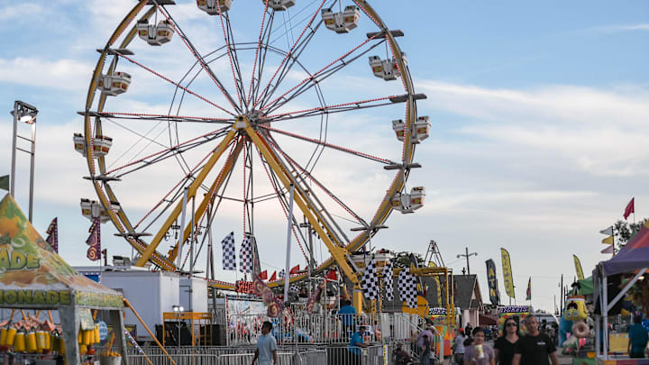 Visitors enjoy the rides at the New Mexico State Fair.