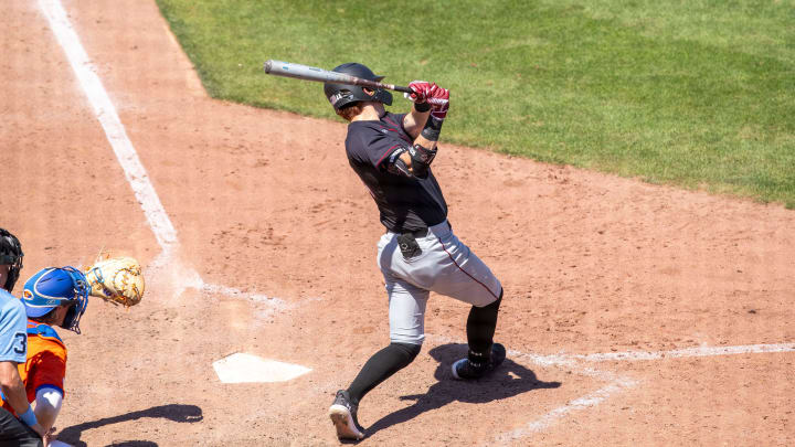 Gamecocks catcher Dalton Reeves (44) with a two-run homer in the top of the ninth inning against the Florida Gators