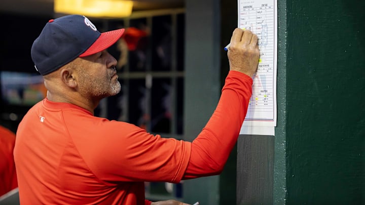 Jun 11, 2024; Detroit, Michigan, USA; Washington Nationals bench coach Miguel Cairo (22) makes changes to his lineup in the eighth inning against the Detroit Tigers at Comerica Park. 