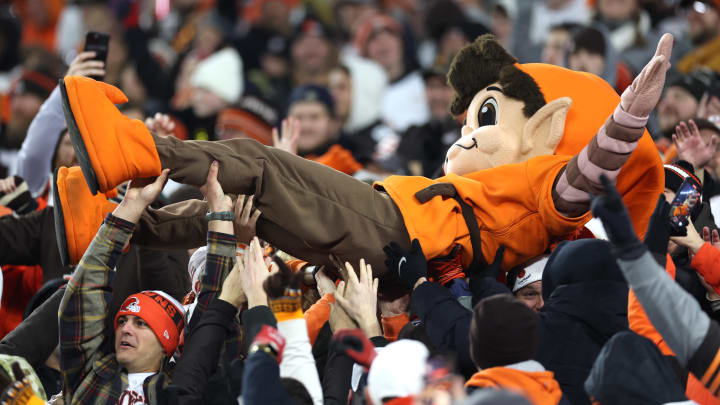 Dec 28, 2023; Cleveland, Ohio, USA; Cleveland Browns mascot Brownie the Elf is carried by fans in the stands after clinching a playoff berth. 