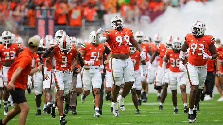 It all starts with Miami defensive tackle Ahmad Moten (99) plugging up the middle of the Hurricanes' defense.