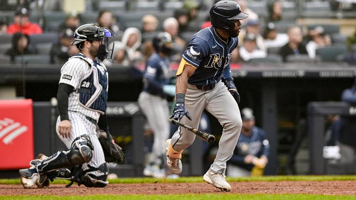 May 24, 2026; Bronx, New York, USA; Tampa Bay Rays center fielder Cedric Mullins (31) hits a single against the New York Yankees during the ninth inning at Yankee Stadium.