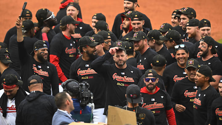 Oct 12, 2024; Cleveland, Ohio, USA; Cleveland Guardians manager Stephen Vogt (12) celebrates with team after defeating the Detroit Tigers during game five of the ALDS for the 2024 MLB Playoffs at Progressive Field. Mandatory Credit: David Richard-Imagn Images