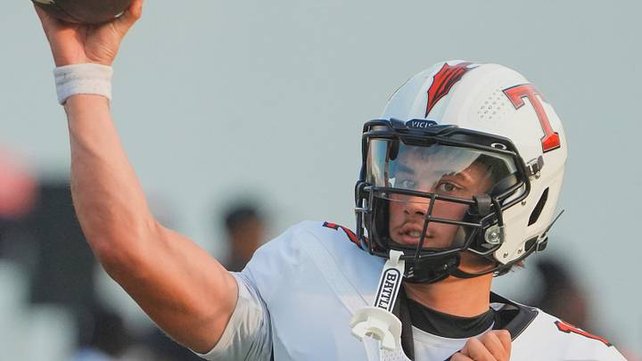 Thompson's Trent Seaborn (12) warms up before the AHSAA Football Kickoff Classic Game in Phenix City, Ala., on Thursday August 20, 2026. Thompson's Trent Seaborn (12) warms up before the AHSAA Football Kickoff Classic Game in Phenix City, Ala., on Thursday August 20, 2026.