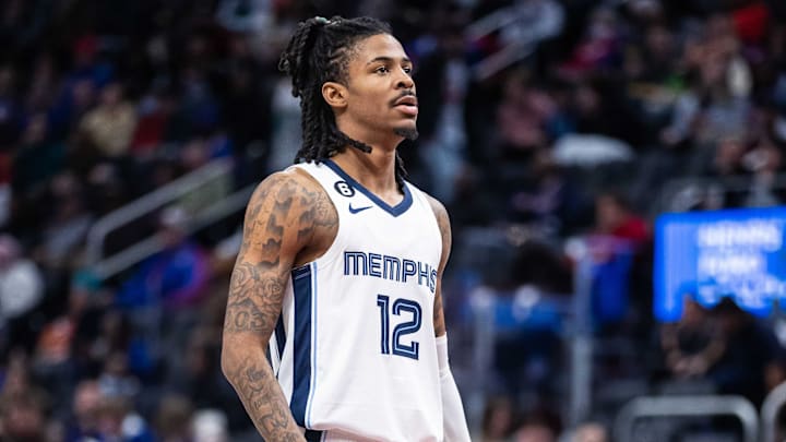 Dec 4, 2022; Detroit, Michigan, USA; Memphis Grizzlies guard Ja Morant (12) prepares for a free throw against the Detroit Pistons in the second half at Little Caesars Arena. Mandatory Credit: Allison Farrand-Imagn Images