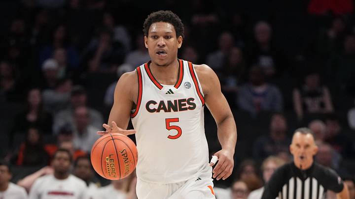Mar 12, 2026; Charlotte, NC, USA; Miami (FL) Hurricanes forward Malik Reneau (5) brings the ball up the floor in the second half at Spectrum Center. Mandatory Credit: Bob Donnan-Imagn Images