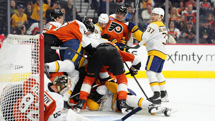 Mar 31, 2025; Philadelphia, Pennsylvania, USA; The Philadelphia Flyers and the Nashville Predators fight in the third period at Wells Fargo Center. Mandatory Credit: Kyle Ross-Imagn Images