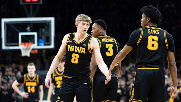 Iowa forward Cooper Koch (8) high-fives Iowa’s Tavion Banks (6) during a Big Ten basketball game against the Nebraska Cornhuskers Feb. 17, 2026 at Carver-Hawkeye Arena in Iowa City, Iowa.