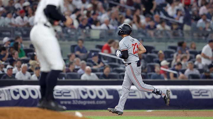 Jun 4, 2024; Bronx, New York, USA; Minnesota Twins third baseman Royce Lewis (23) rounds the bases after hitting a solo home run against New York Yankees relief pitcher Tommy Kahnle (41) during the seventh inning at Yankee Stadium. Mandatory Credit: Brad Penner-USA TODAY Sports