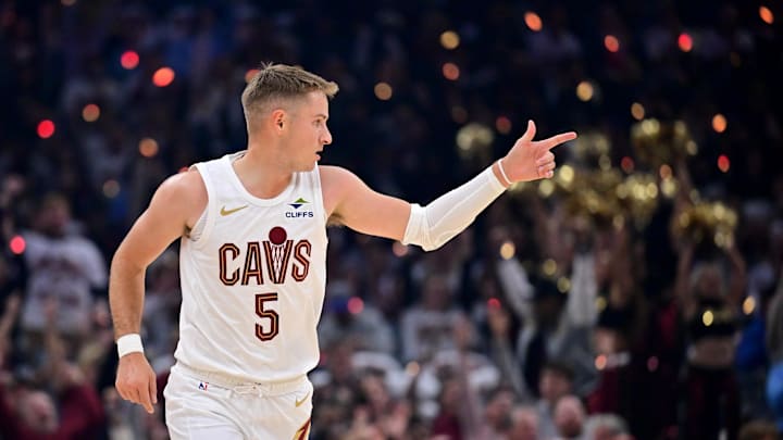 Oct 26, 2025; Cleveland, Ohio, USA; Cleveland Cavaliers guard Sam Merrill (5) celebrates after hitting a three point basket against the Milwaukee Bucks during the first half at Rocket Arena. Mandatory Credit: Ken Blaze-Imagn Images