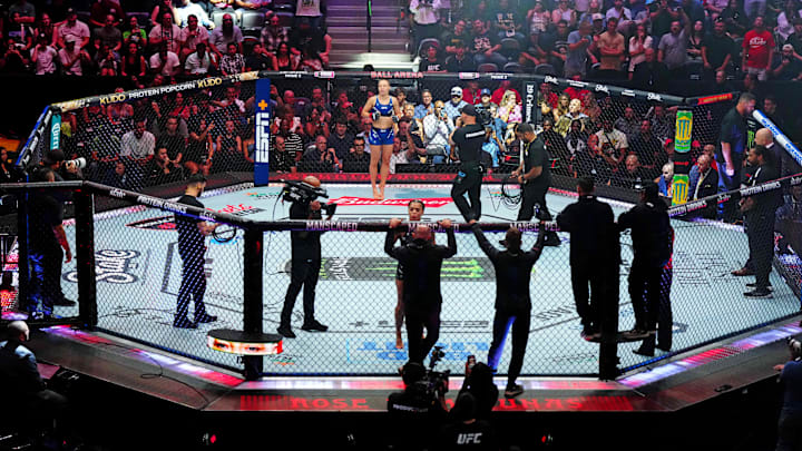 Jul 13, 2024; Denver, Colorado, USA; A view of the octagon before Rose Namajunas (red gloves) fights Tracy Cortez (blue gloves) during UFC Fight Night at Ball Arena. Mandatory Credit: Ron Chenoy-Imagn Images