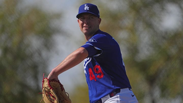 Feb 14, 2025; Glendale, AZ, USA; Los Angeles Dodgers pitcher Blake Treinen (49) performs a drill during a Spring Training workout at Camelback Ranch. Mandatory Credit: Joe Camporeale-Imagn Images Feb 14, 2025; Glendale, AZ, USA; Los Angeles Dodgers pitcher Blake Treinen (49) performs a drill during a Spring Training workout at Camelback Ranch. Mandatory Credit: Joe Camporeale-Imagn Images