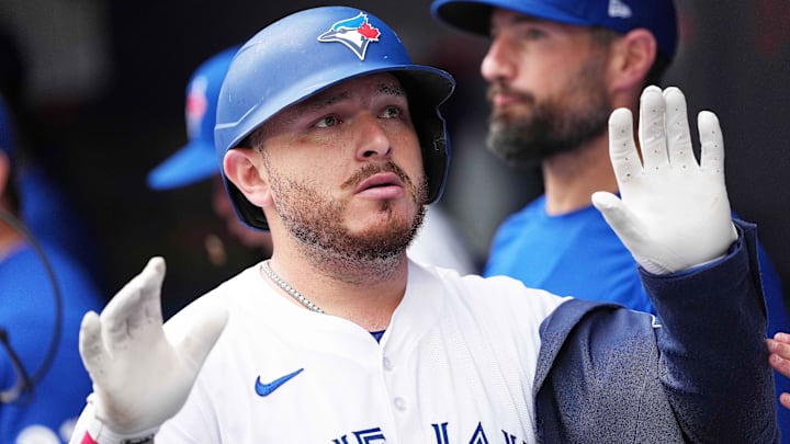 Aug 17, 2025; Toronto, Ontario, CAN; Toronto Blue Jays catcher Alejandro Kirk (30) celebrates in the dugout after hitting a home run against the Texas Rangers during the second inning at Rogers Centre. Aug 17, 2025; Toronto, Ontario, CAN; Toronto Blue Jays catcher Alejandro Kirk (30) celebrates in the dugout after hitting a home run against the Texas Rangers during the second inning at Rogers Centre.