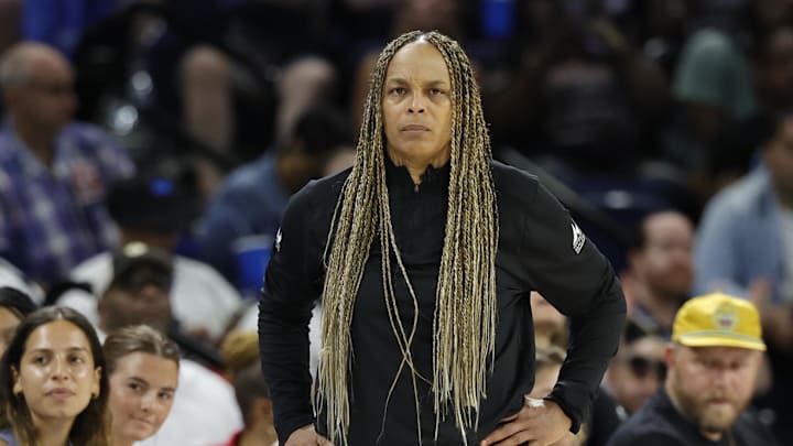 Weatherspoon looks on from the sidelines during the first half against the New York Liberty.