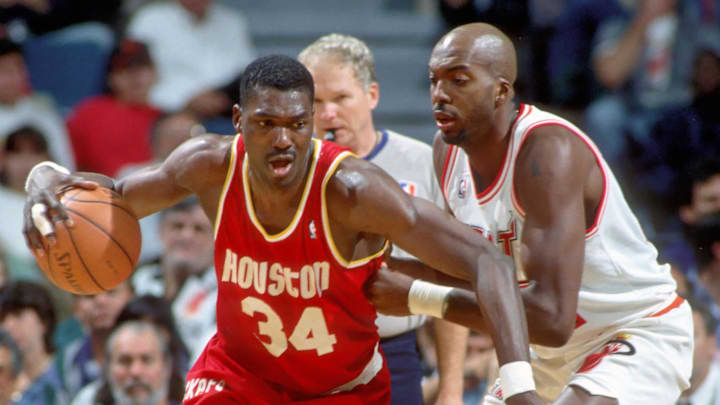 Unknown Date; Miami, FL, USA; FILE PHOTO; Houston Rockets center #34 HAKEEM OLAJUWON in action against JOHN SALLEY of the Miami Heat at the Miami Arena during the 1994-95 season. Mandatory Credit: Photo By Imagn Images (c) Copyright Imagn Images Unknown Date; Miami, FL, USA; FILE PHOTO; Houston Rockets center #34 HAKEEM OLAJUWON in action against JOHN SALLEY of the Miami Heat at the Miami Arena during the 1994-95 season. Mandatory Credit: Photo By Imagn Images (c) Copyright Imagn Images