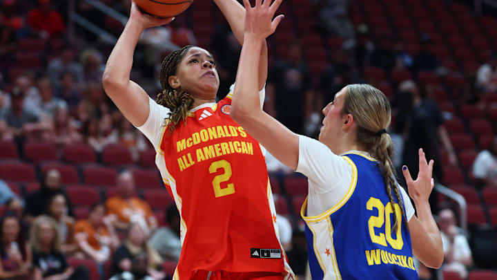 Mar 31, 2026; Glendale, AZ, USA; Saniyah Hall (2) shoots the ball against McKenna Woliczko (20) during the McDonalds All American Girls Game at Desert Diamond Arena. Mandatory Credit: Mark J. Rebilas-Imagn Images