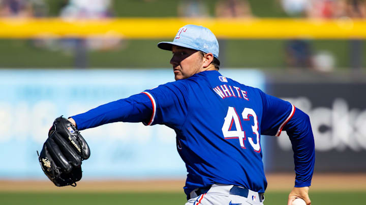 Texas Rangers pitcher Owen White against the Seattle Mariners during a spring training baseball game at Peoria Sports Complex in 2023.