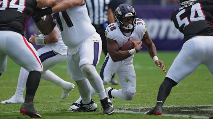 Aug 17, 2024; Baltimore, Maryland, USA; Baltimore Ravens  running back Chris Collier (38) gains yards in the fourth quarter against the Atlanta Falcons at M&T Bank Stadium. Mandatory Credit: Mitch Stringer-Imagn Images