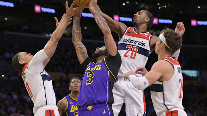 Jan 21, 2025; Los Angeles, California, USA; Washington Wizards guard Carlton Carrington (8), forward Alexandre Sarr (20) and forward Corey Kispert (24) battle Los Angeles Lakers forward Anthony Davis (3) for a rebound at Crypto.com Arena. Mandatory Credit: Jayne Kamin-Oncea-Imagn Images Jan 21, 2025; Los Angeles, California, USA; Washington Wizards guard Carlton Carrington (8), forward Alexandre Sarr (20) and forward Corey Kispert (24) battle Los Angeles Lakers forward Anthony Davis (3) for a rebound at Crypto.com Arena. Mandatory Credit: Jayne Kamin-Oncea-Imagn Images