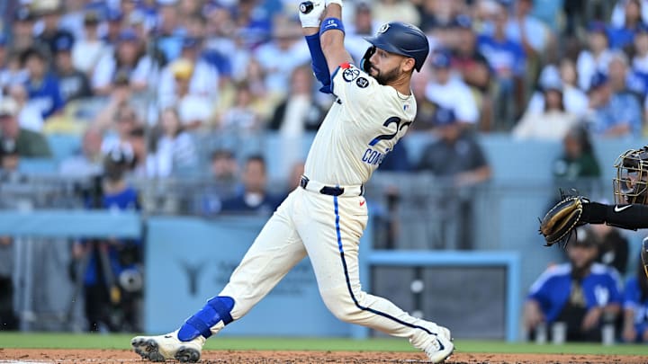 Aug 16, 2025; Los Angeles, California, USA; Los Angeles Dodgers outfielder Michael Conforto (23) hits a RBI single during the first inning against the San Diego Padres at Dodger Stadium. Mandatory Credit: William Liang-Imagn Images Aug 16, 2025; Los Angeles, California, USA; Los Angeles Dodgers outfielder Michael Conforto (23) hits a RBI single during the first inning against the San Diego Padres at Dodger Stadium. Mandatory Credit: William Liang-Imagn Images